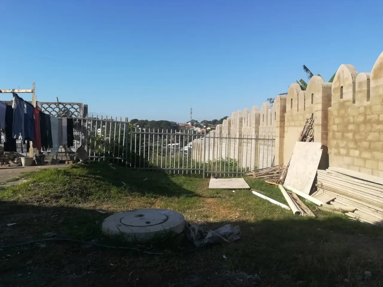 Project site — construction site with partially built structures and fencing
