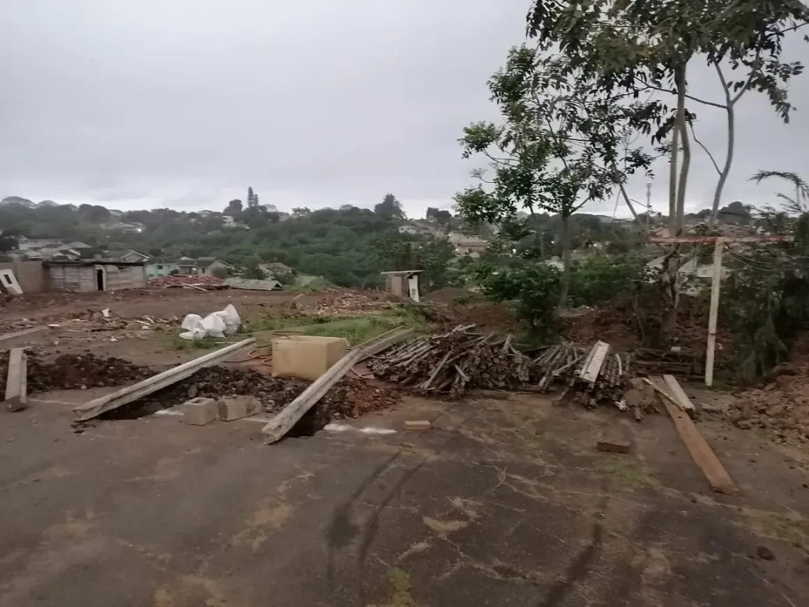 Project site — rural development site with scattered building materials