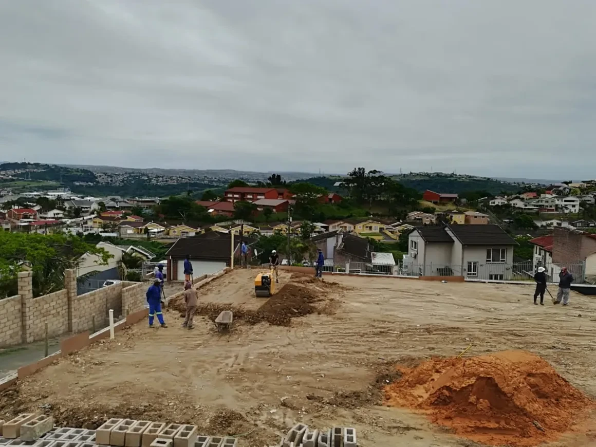 Project site — workers on rooftop maintenance