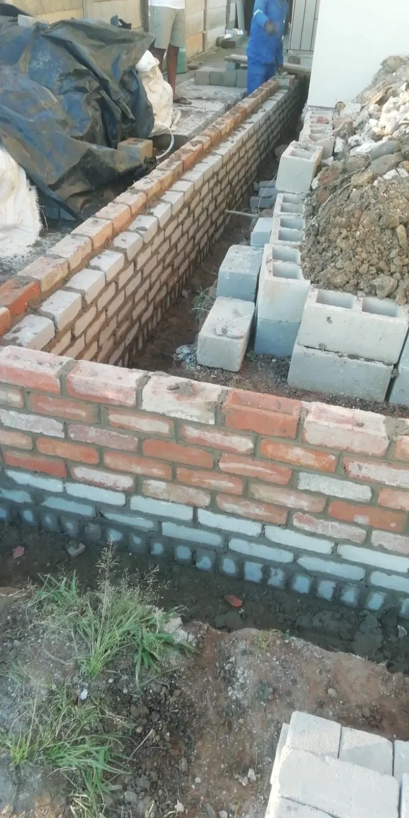 Project site — brick and concrete block masonry work in progress