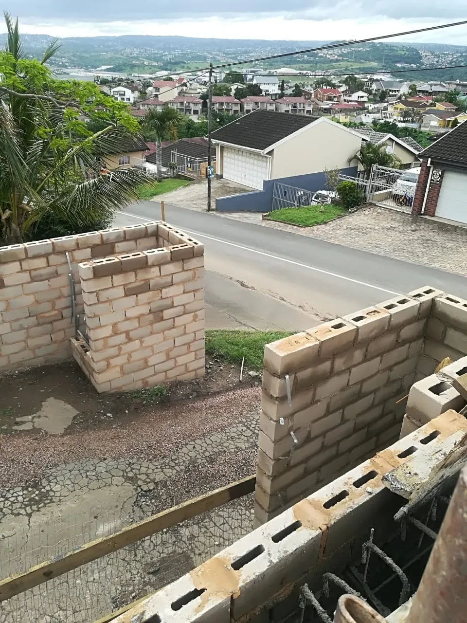 Project site — brick boundary wall construction