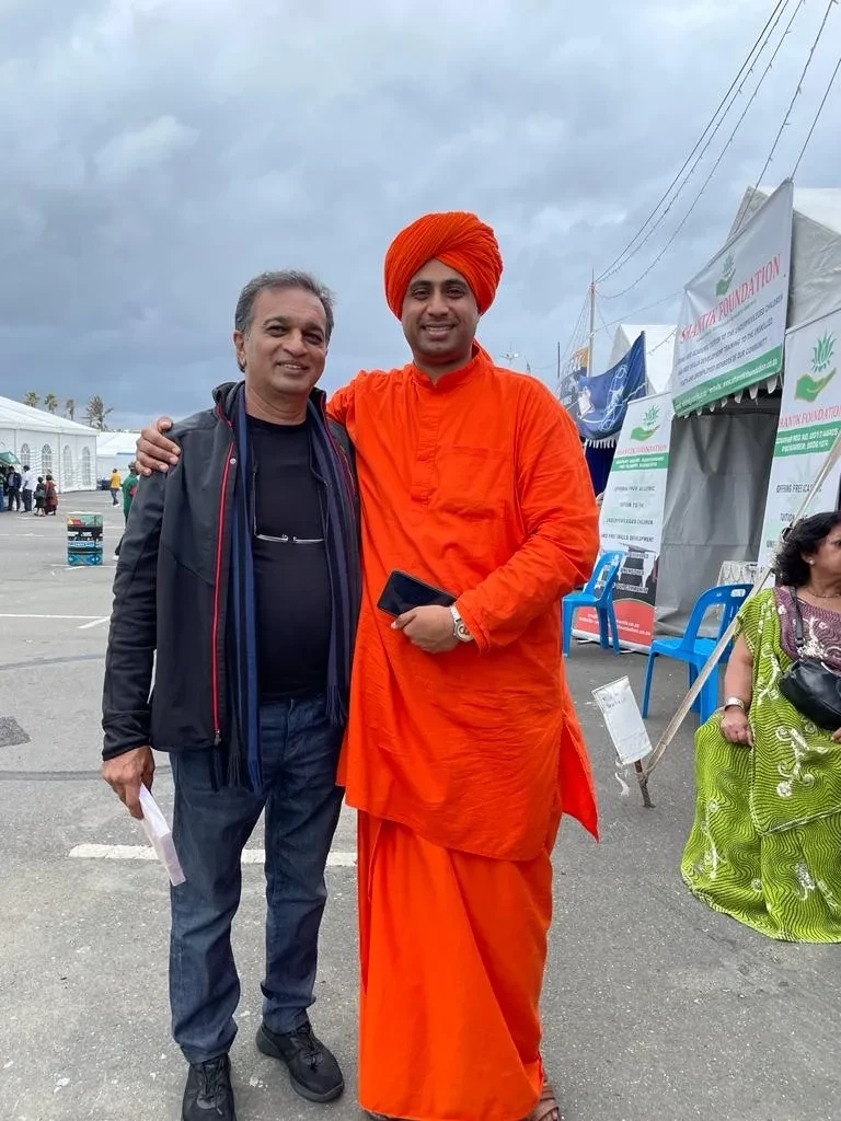 Project site — two people at outdoor community event